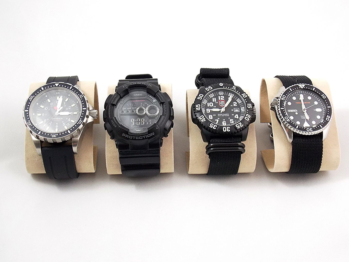 Left to Right: Marathon JSAR, Casio G-Shock GD100-1B, Luminox 3051 Colormark, Seiko SKX007K