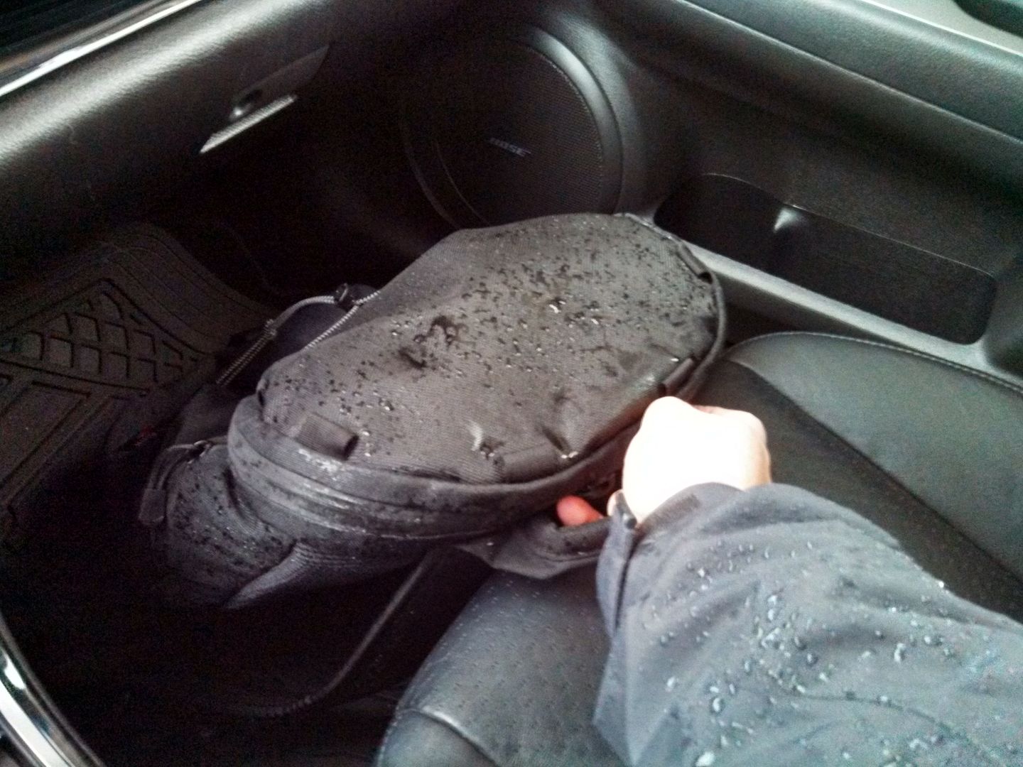 Tom Bihn Smart Alec riding shotgun after coming out in the rain