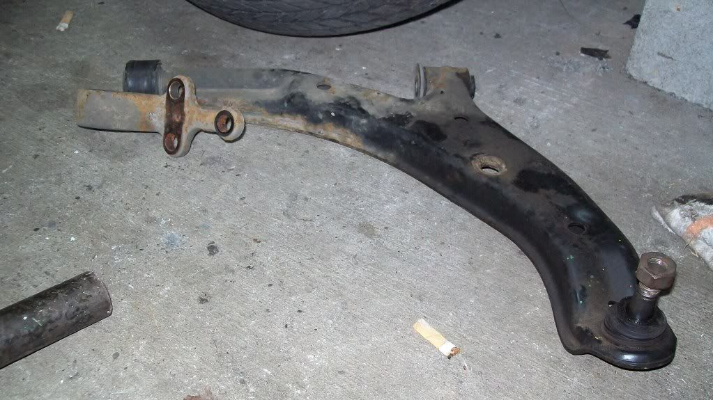 How to remove lower control arm nissan xterra